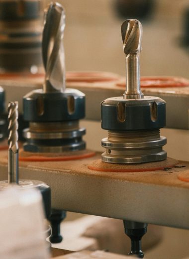 Detailed shot of drill bits in a workshop setting, highlighting precision and technology.